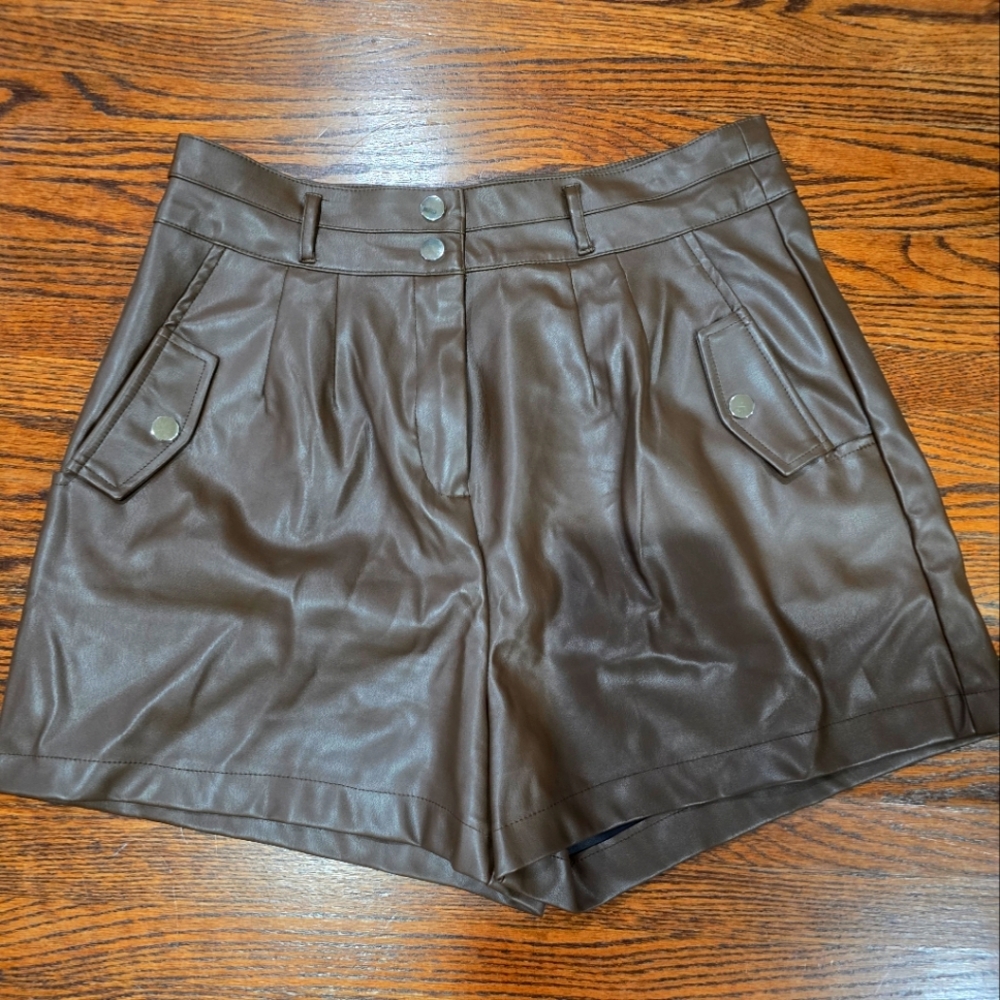 Chocolate faux leather shorts. Large
